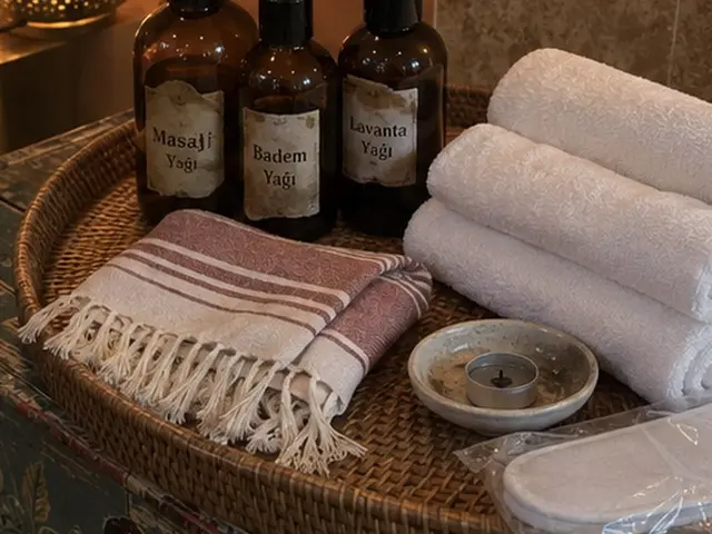 Hasır sepette masaj yağları, peştemal ve havlular — Kumburgaz, Masaj Salonun